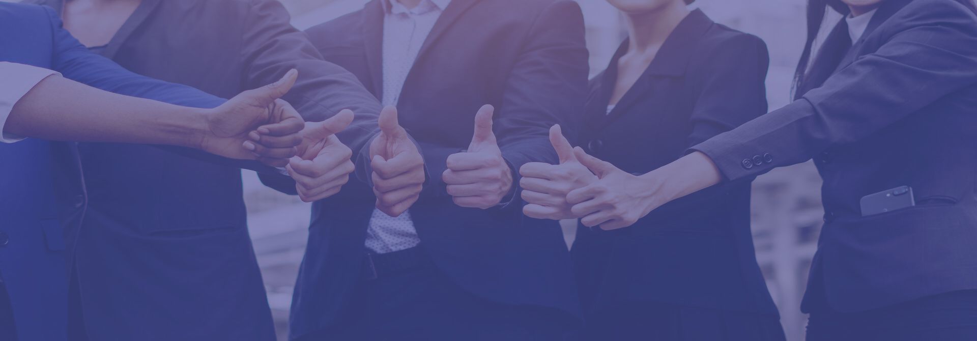 Business team celebrating successful workplace outcomes